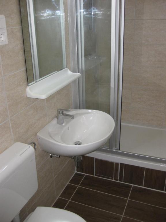 Kúpeľňa v ubytovaní Parti Apartman
