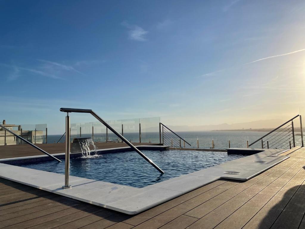 a swimming pool on top of a building at Hotel Las Vegas in Salou