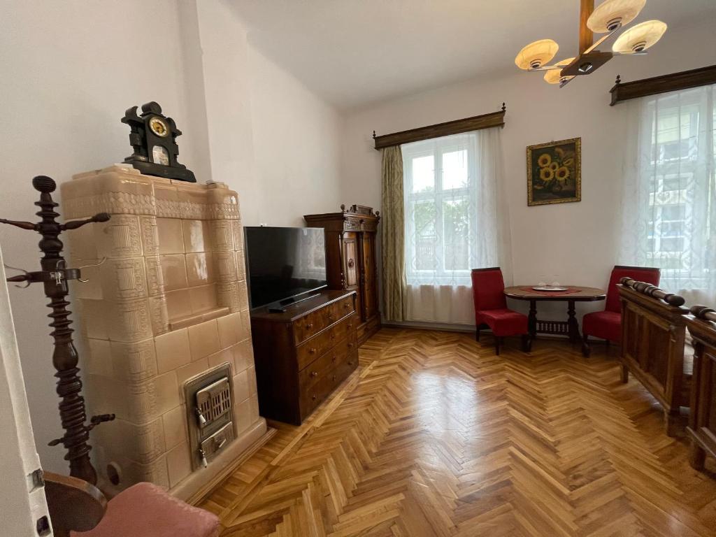 TV a/nebo společenská místnost v ubytování Guest House Hena