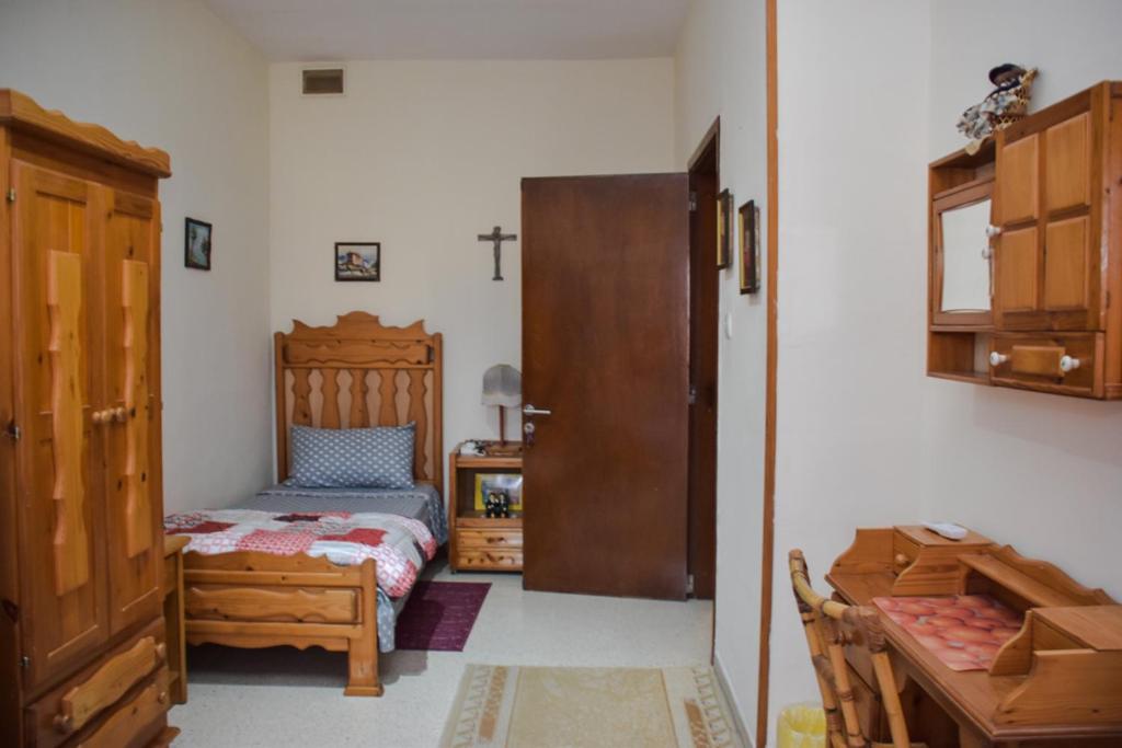 Postel nebo postele na pokoji v ubytování Mangion House