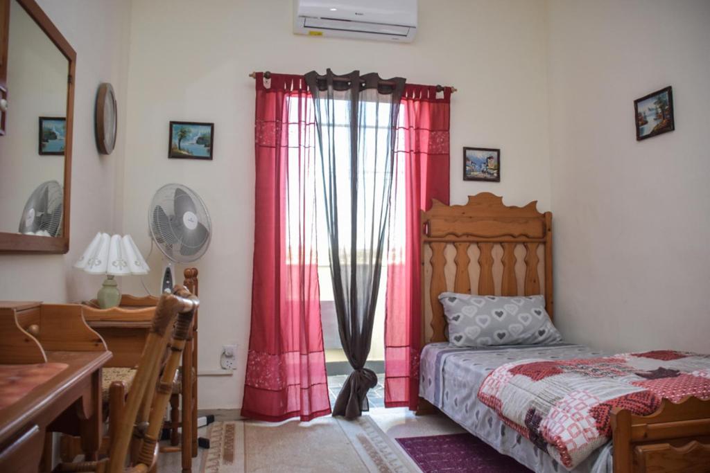 Postel nebo postele na pokoji v ubytování Mangion House