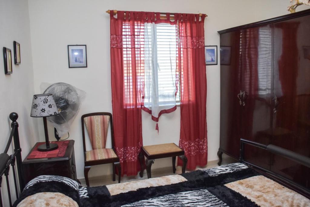 Postel nebo postele na pokoji v ubytování Mangion House