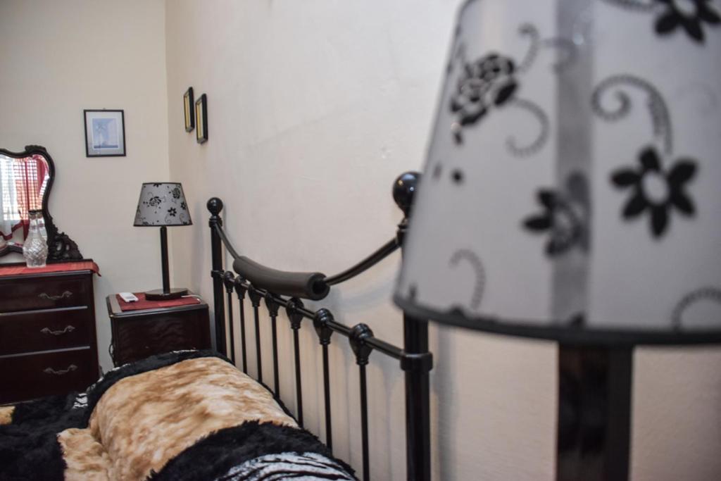 Postel nebo postele na pokoji v ubytování Mangion House