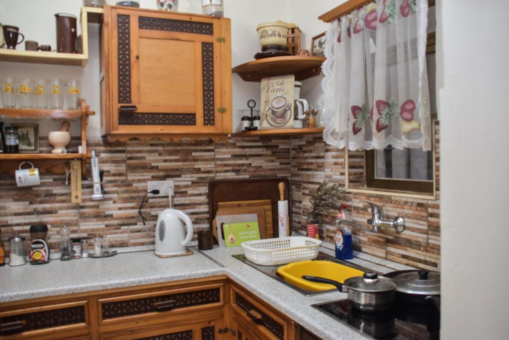 Kuchyň nebo kuchyňský kout v ubytování Mangion House