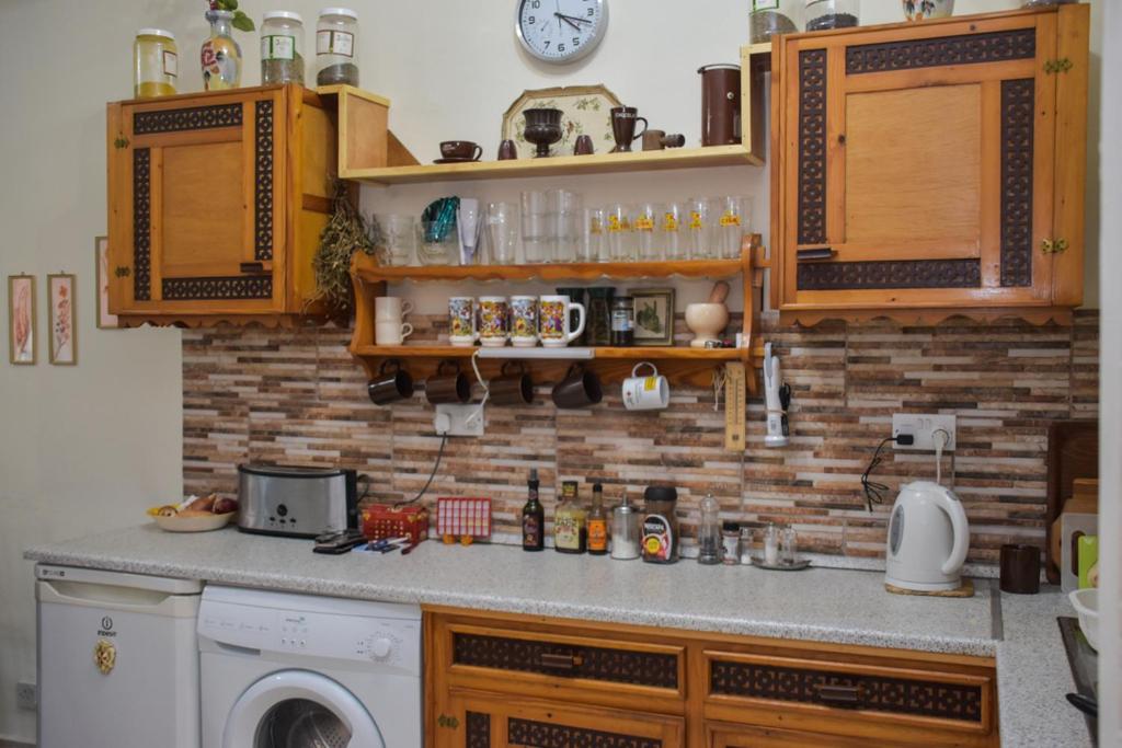 Kuchyň nebo kuchyňský kout v ubytování Mangion House