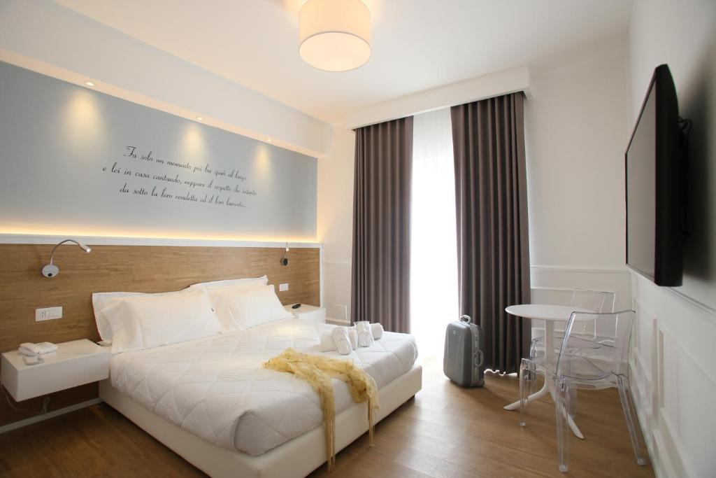 Posteľ alebo postele v izbe v ubytovaní Hotel Le Ginestre Family & Wellness
