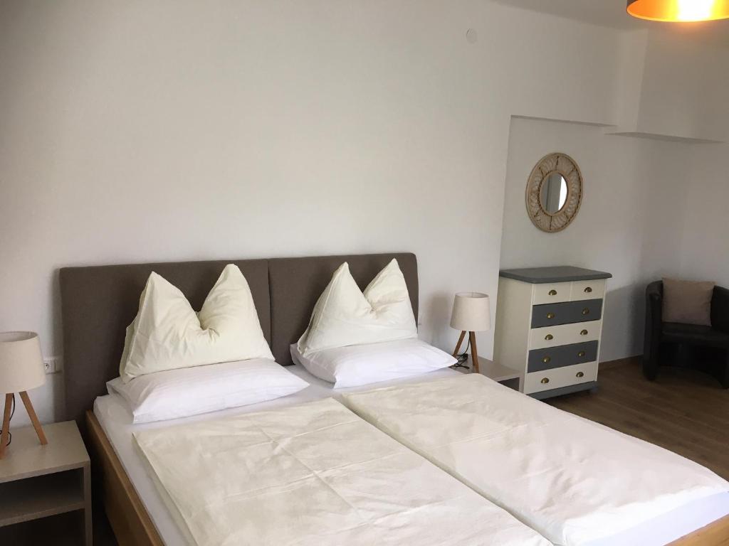 Postel nebo postele na pokoji v ubytování Appartements Käthe