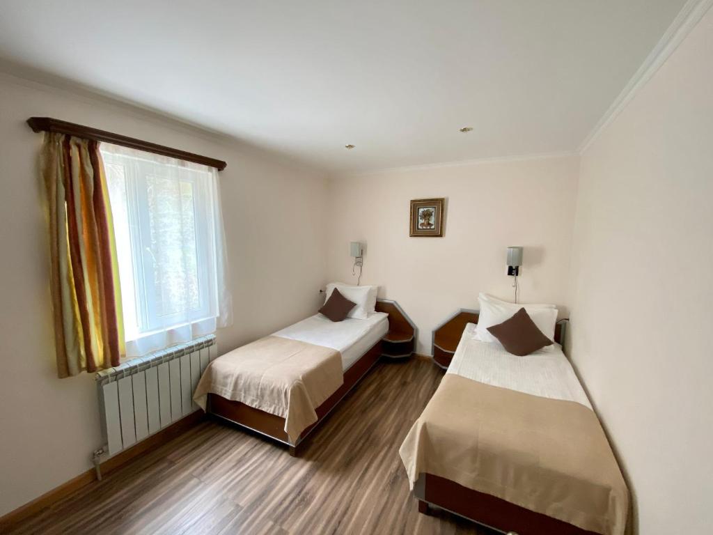 Postel nebo postele na pokoji v ubytování Alva Hotel & Spa