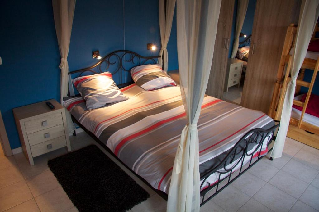 Postel nebo postele na pokoji v ubytování Breeden Steeger Hoeve