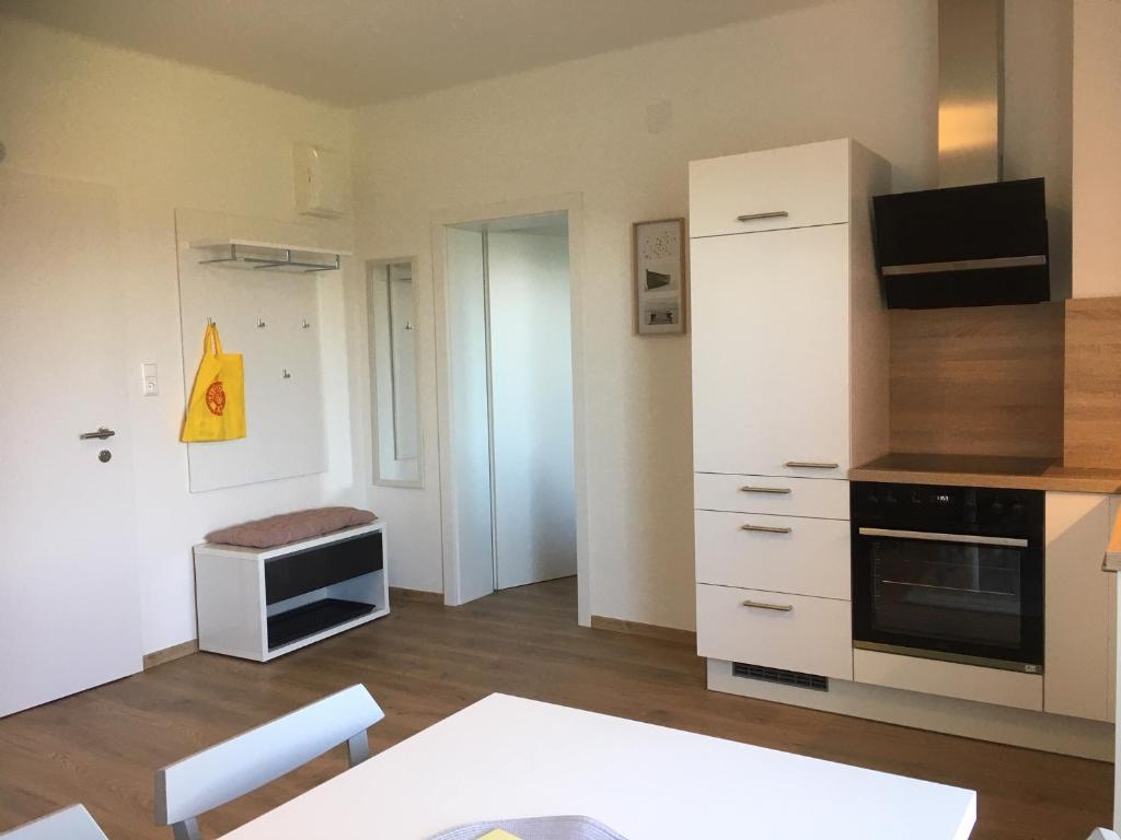Kuchyň nebo kuchyňský kout v ubytování Appartements Käthe