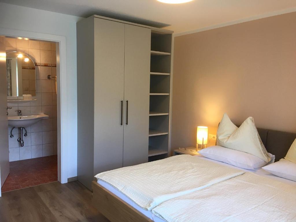Postel nebo postele na pokoji v ubytování Appartements Käthe