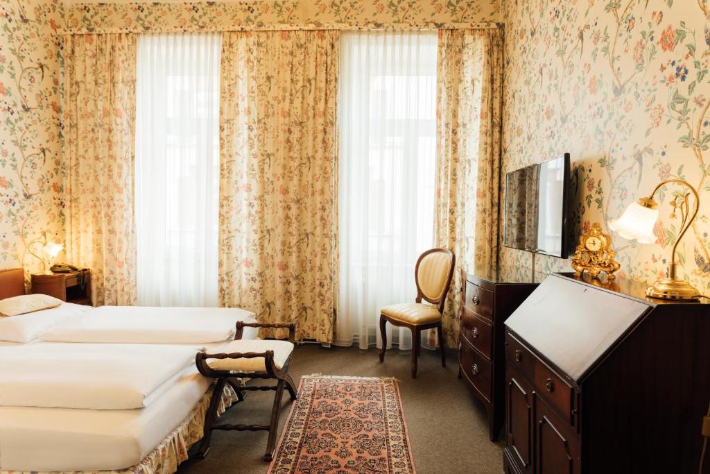 Postel nebo postele na pokoji v ubytování Das Kleine Hotel in ruhiger Stadtlage