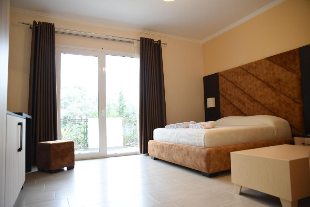 Postel nebo postele na pokoji v ubytování Monte Mare Hotel