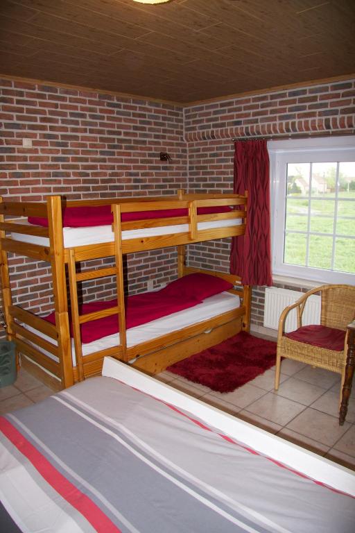 Postel nebo postele na pokoji v ubytování Breeden Steeger Hoeve