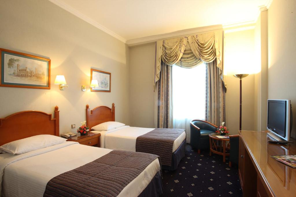 Postel nebo postele na pokoji v ubytování Sea View Hotel Dubai