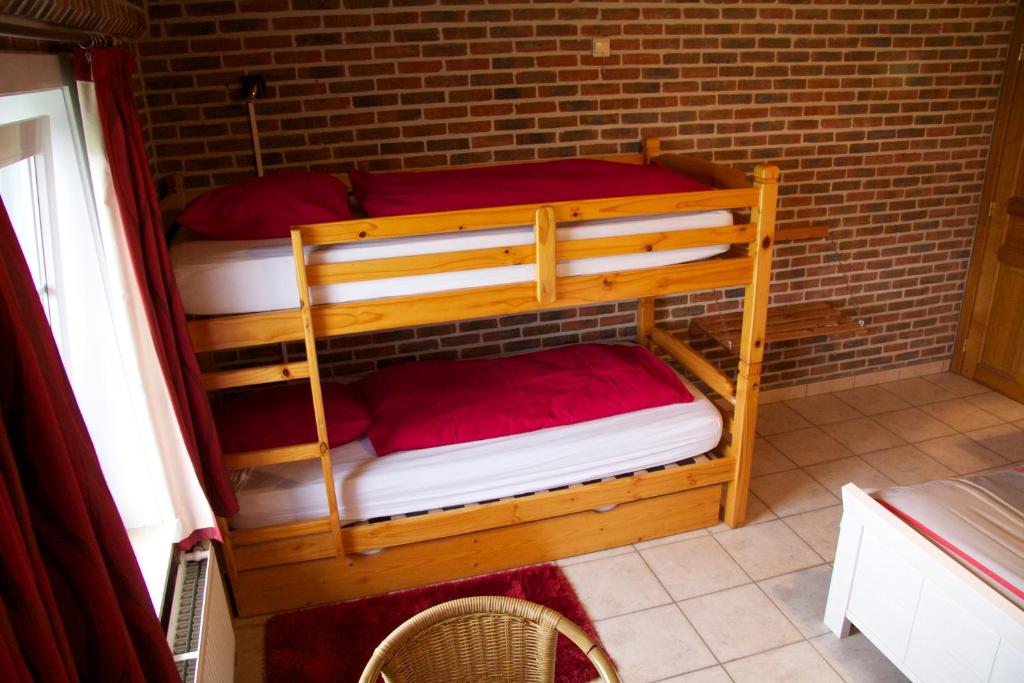 Postel nebo postele na pokoji v ubytování Breeden Steeger Hoeve