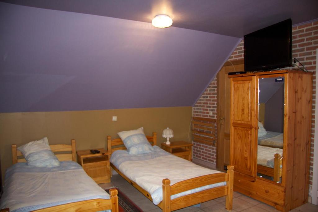 Postel nebo postele na pokoji v ubytování Breeden Steeger Hoeve