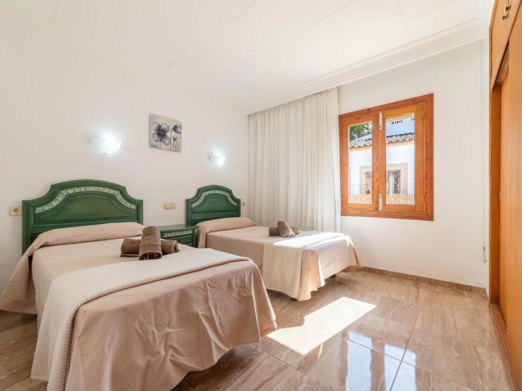 Postel nebo postele na pokoji v ubytování Villa Villa Rosa by Interhome