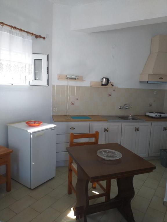 Kuchyň nebo kuchyňský kout v ubytování Gioula's Residence