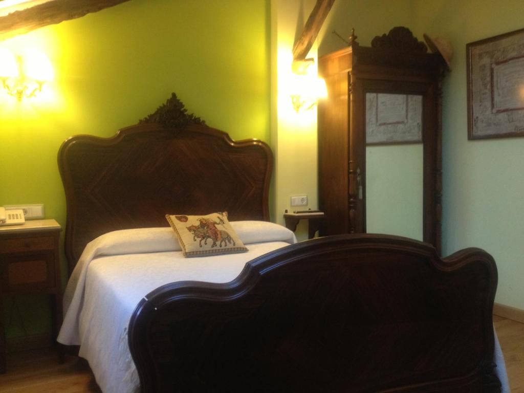 Postel nebo postele na pokoji v ubytování Hotel Rural "El secreto del Castillo"