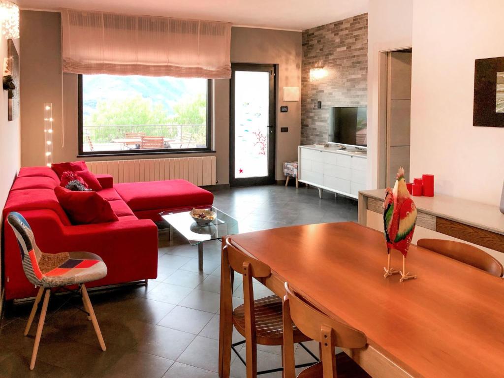A television and/or entertainment centre at Holiday Home Dada by Interhome