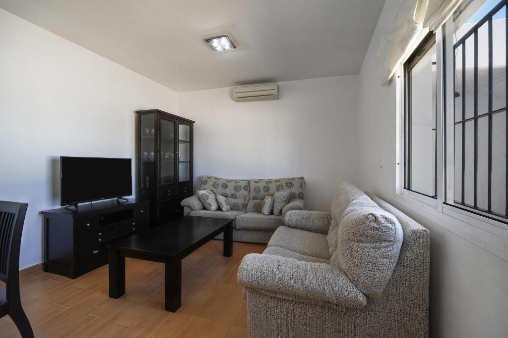 Posezení v ubytování Apartamento La Higuera 4