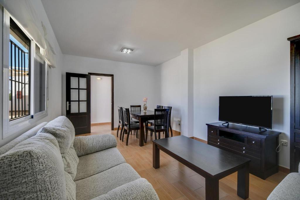 TV a/nebo společenská místnost v ubytování Apartamento La Higuera 4