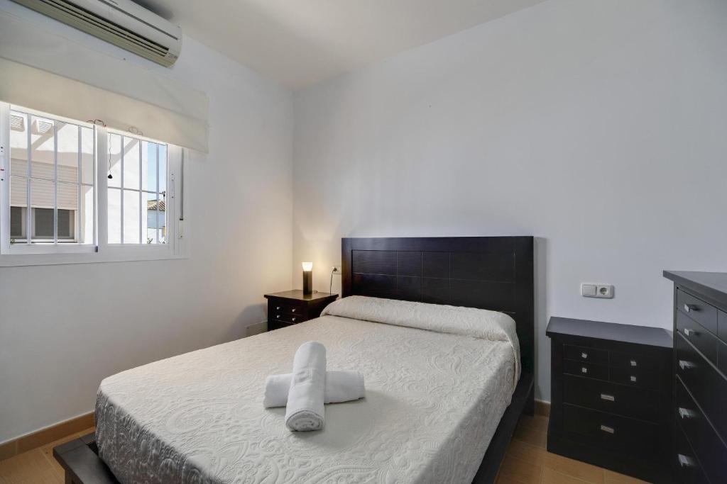 Postel nebo postele na pokoji v ubytování Apartamento La Higuera 4