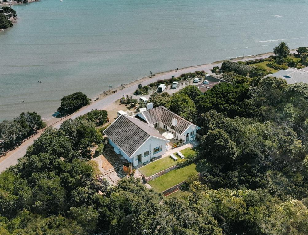 an aerial view of a house on the beach at Leisure Isle Seaside Cottage in Knysna