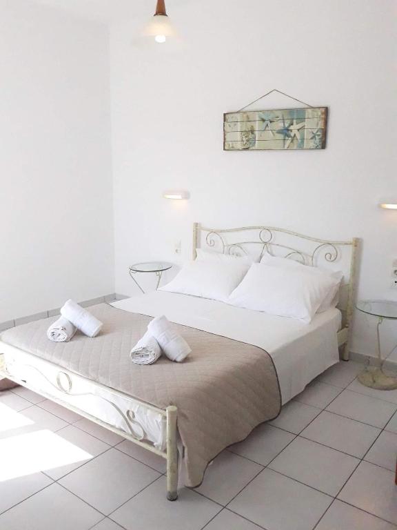 Posteľ alebo postele v izbe v ubytovaní V-rooms in Milos Cyclades