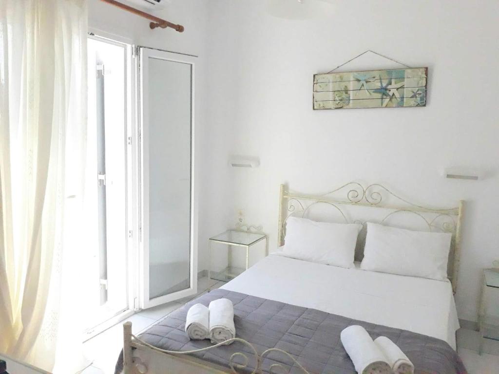 Posteľ alebo postele v izbe v ubytovaní V-rooms in Milos Cyclades