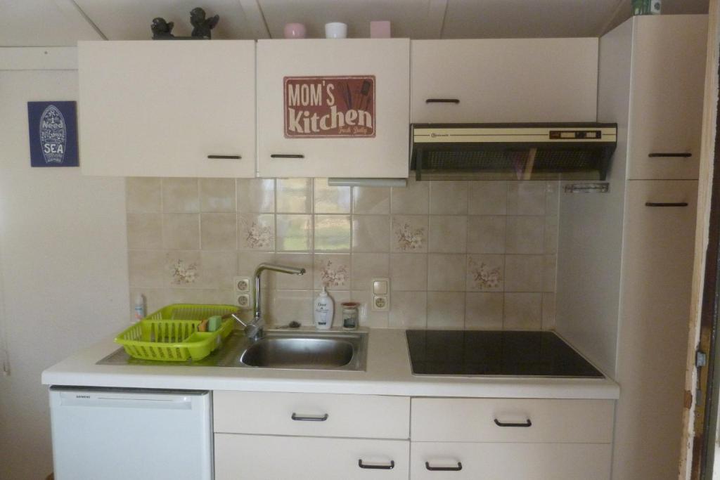 Kuchyň nebo kuchyňský kout v ubytování Mi Corazon huisnummer 122