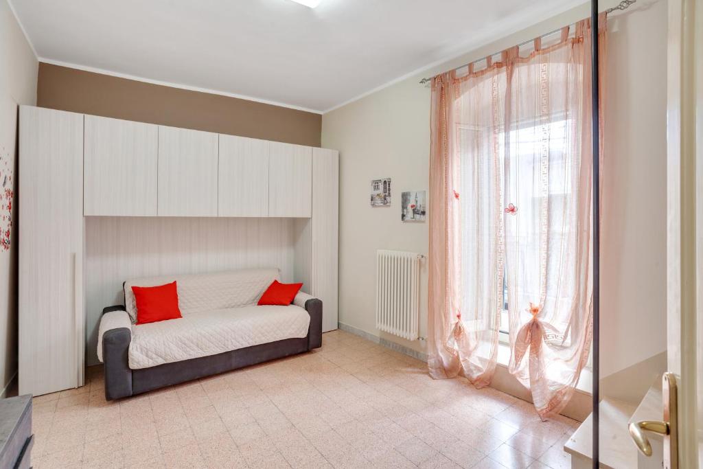 Łóżko lub łóżka w pokoju w obiekcie Casa Alessandra Terrace Flat in Conversano