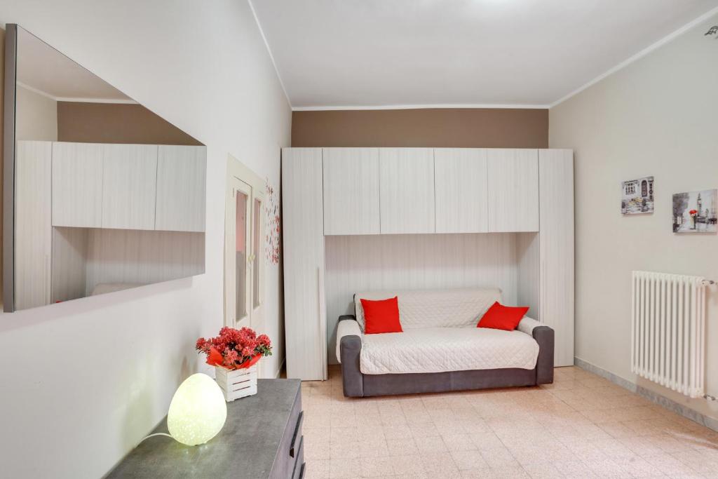 Łóżko lub łóżka w pokoju w obiekcie Casa Alessandra Terrace Flat in Conversano