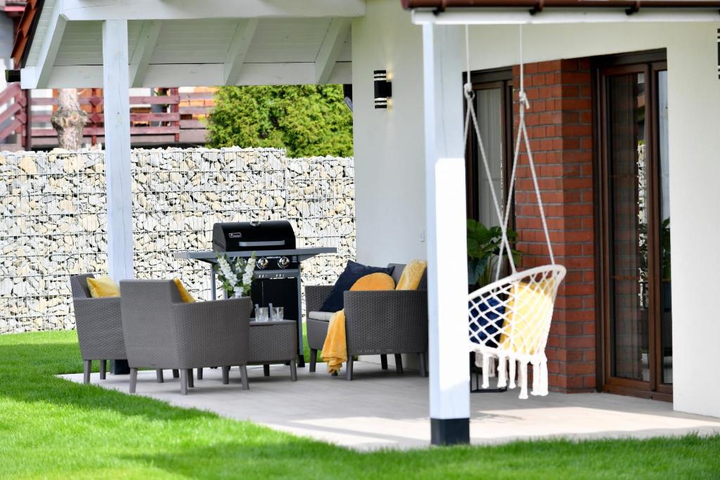 Patio alebo iná vonkajšia časť ubytovania Apartamenty na Dworskiej - BLISKO ENERGYLANDIA ZATORLAND