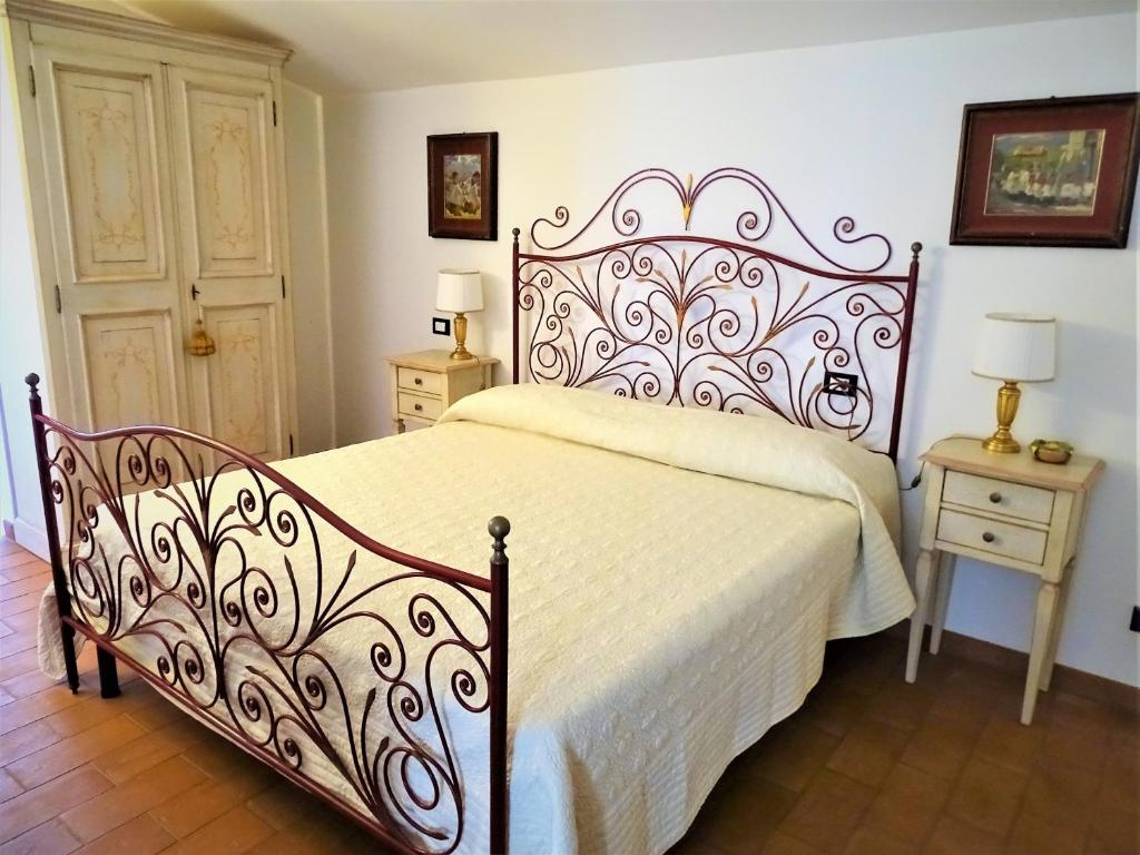 A bed or beds in a room at Teruzzi Country House