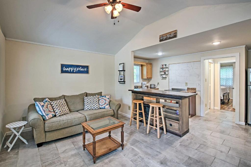 a living room with a couch and a kitchen at Near Natl Park Hollywood Park Hot Springs Home in Hot Springs