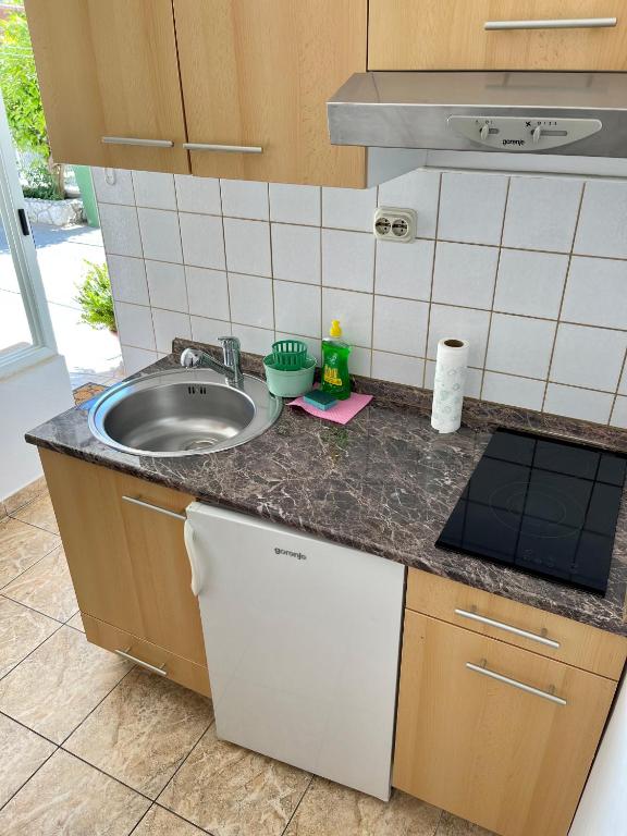 Kuchyň nebo kuchyňský kout v ubytování Rooms & Apartments Tepsa - Centre