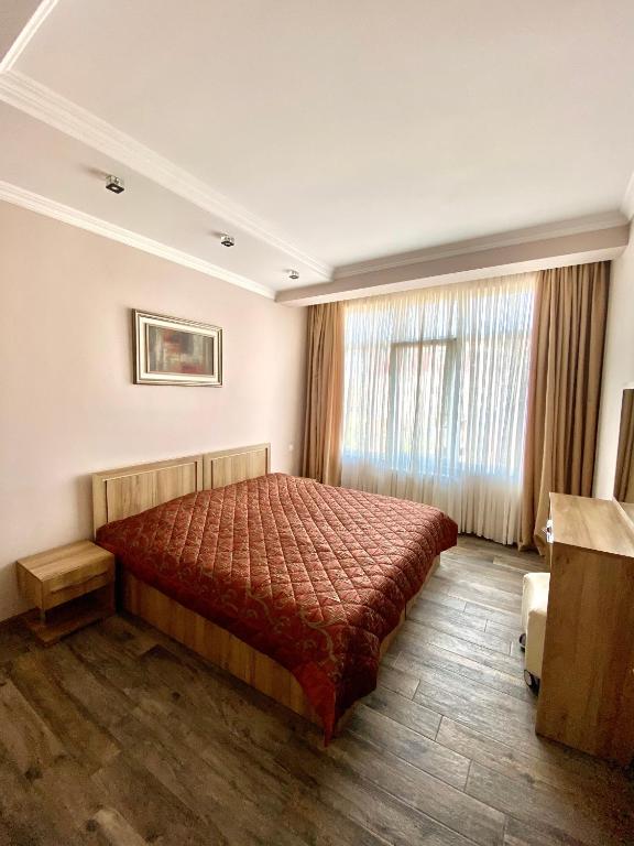 Postel nebo postele na pokoji v ubytování Villa Old Batumi
