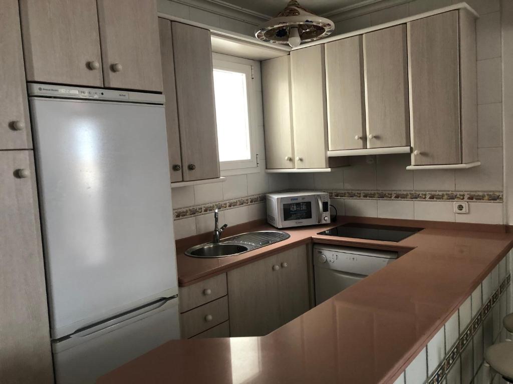 A kitchen or kitchenette at Almería Centro