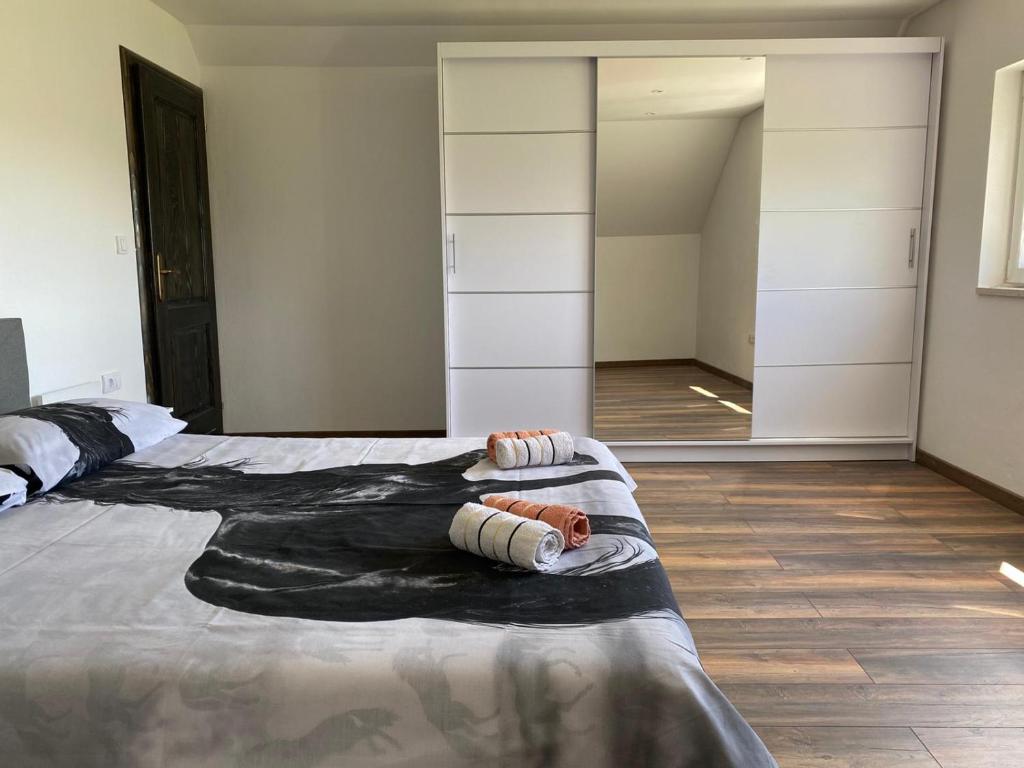 Postel nebo postele na pokoji v ubytování Milka house