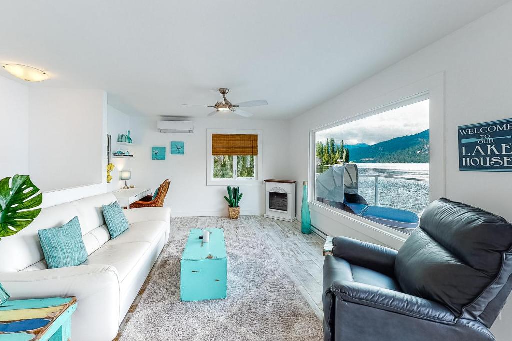 a living room with a couch and a table at Brooks Lake House in Christina
