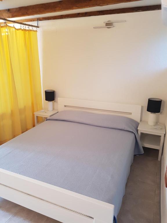 Postel nebo postele na pokoji v ubytování Apartman STELLA MARIS