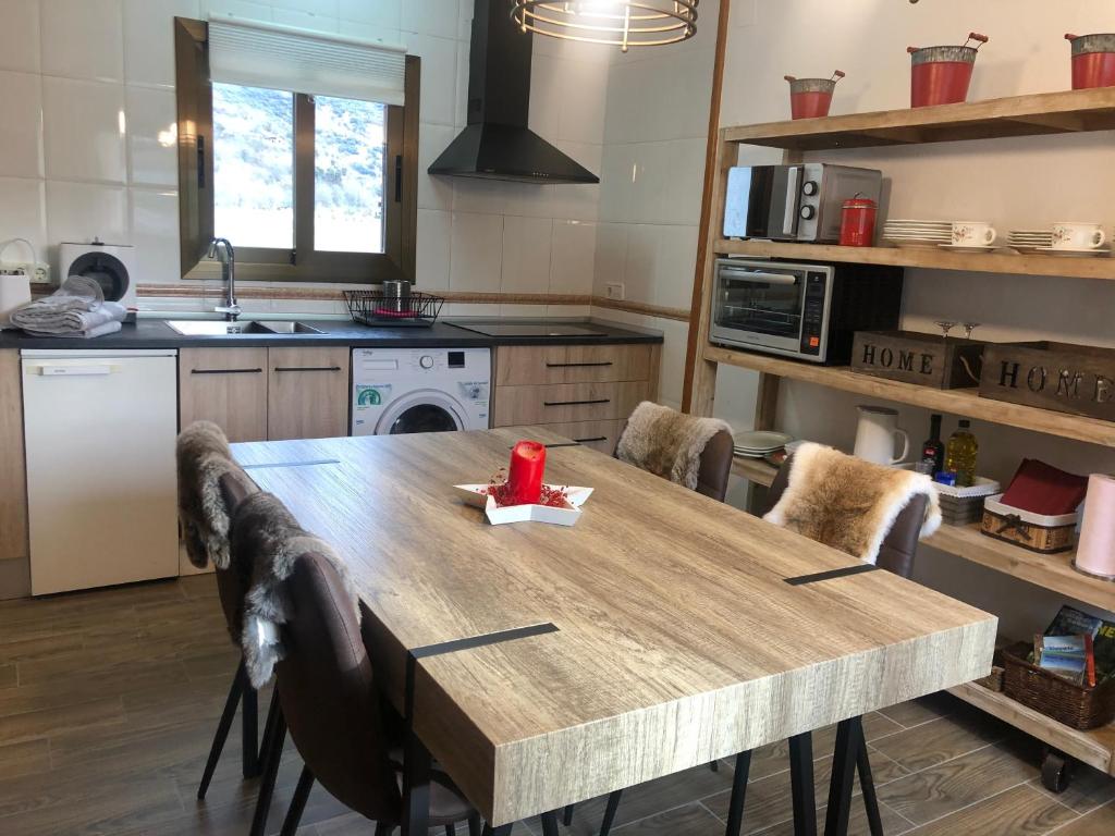 Kuchyň nebo kuchyňský kout v ubytování DUPLEX ALPINO