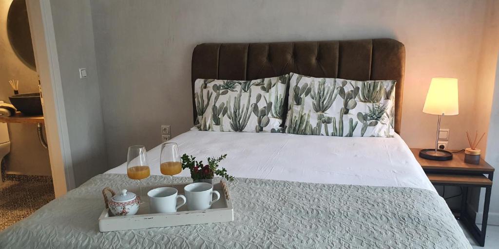 Postel nebo postele na pokoji v ubytování Dioni Luxury House