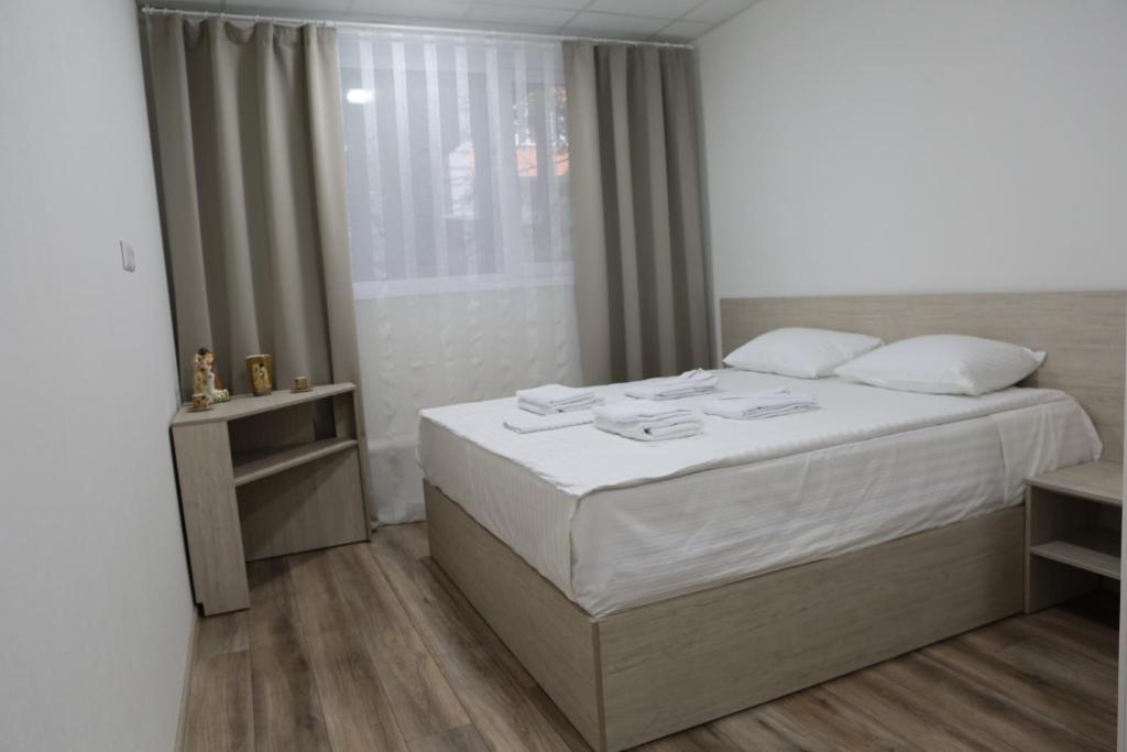 Postel nebo postele na pokoji v ubytování Міні-Готель Білий Квадрат