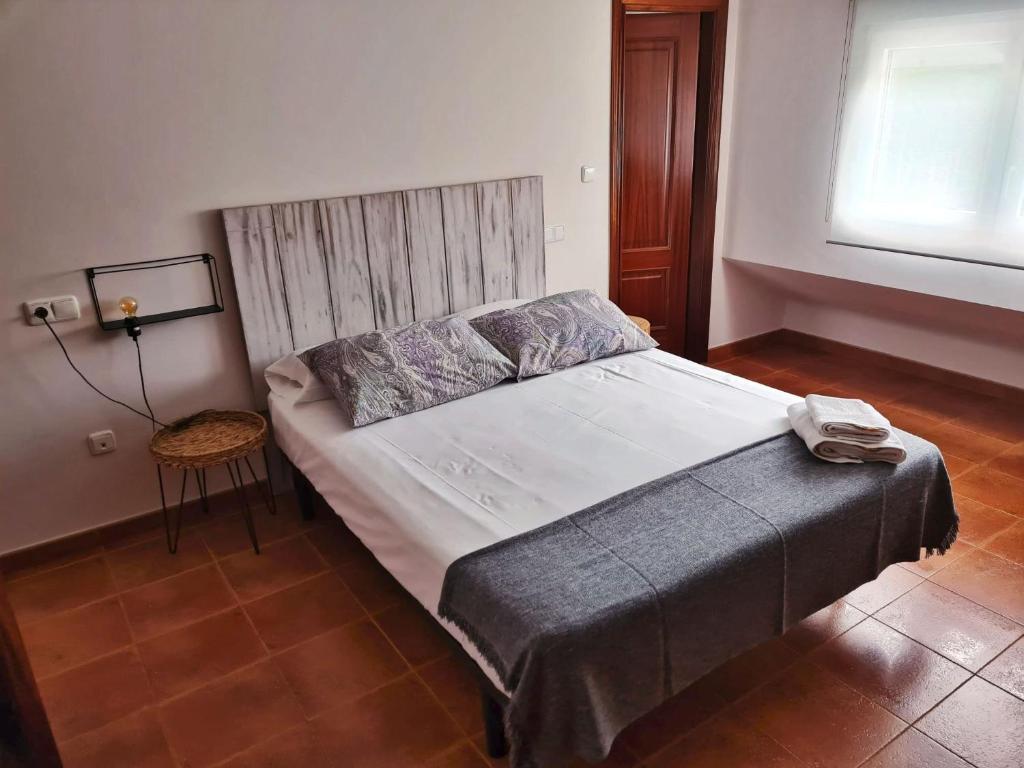 Postel nebo postele na pokoji v ubytování Piso Don Ramón
