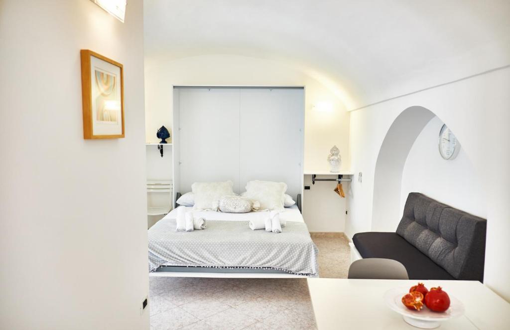 Posteľ alebo postele v izbe v ubytovaní Balilla Guest House - OSTUNI CENTRO - All Confort