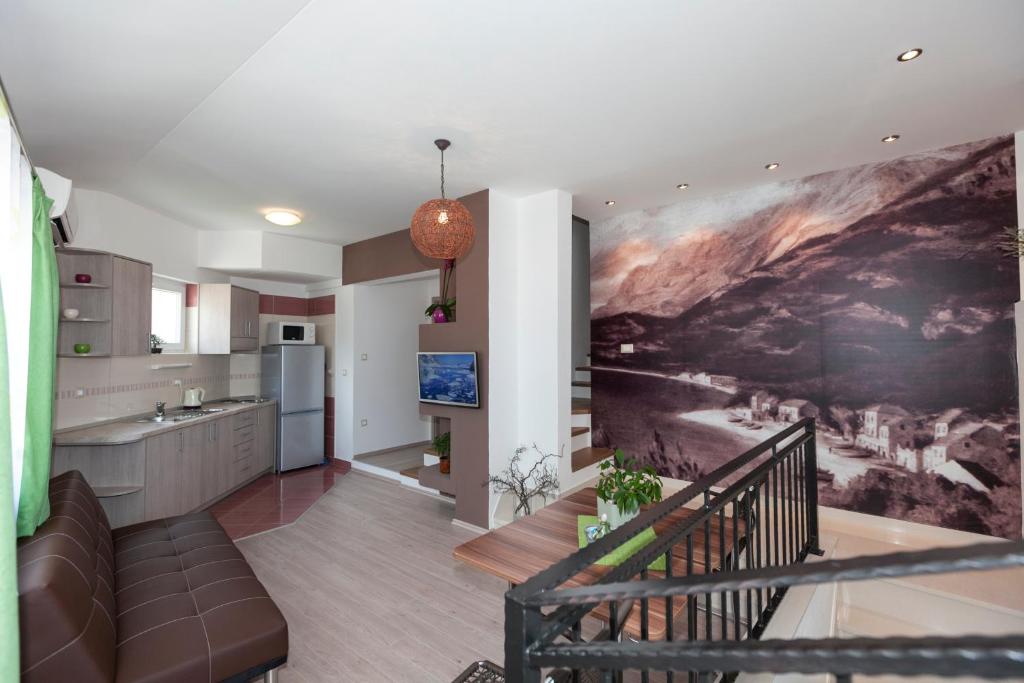 Kuchyň nebo kuchyňský kout v ubytování Apartmani Iva