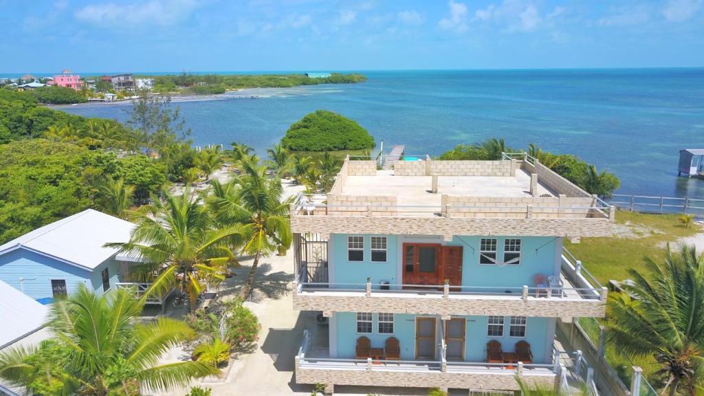 an aerial view of a house on the beach at Hidden Treasure Vacation Home Bay Blue Suite 2 in Belize City